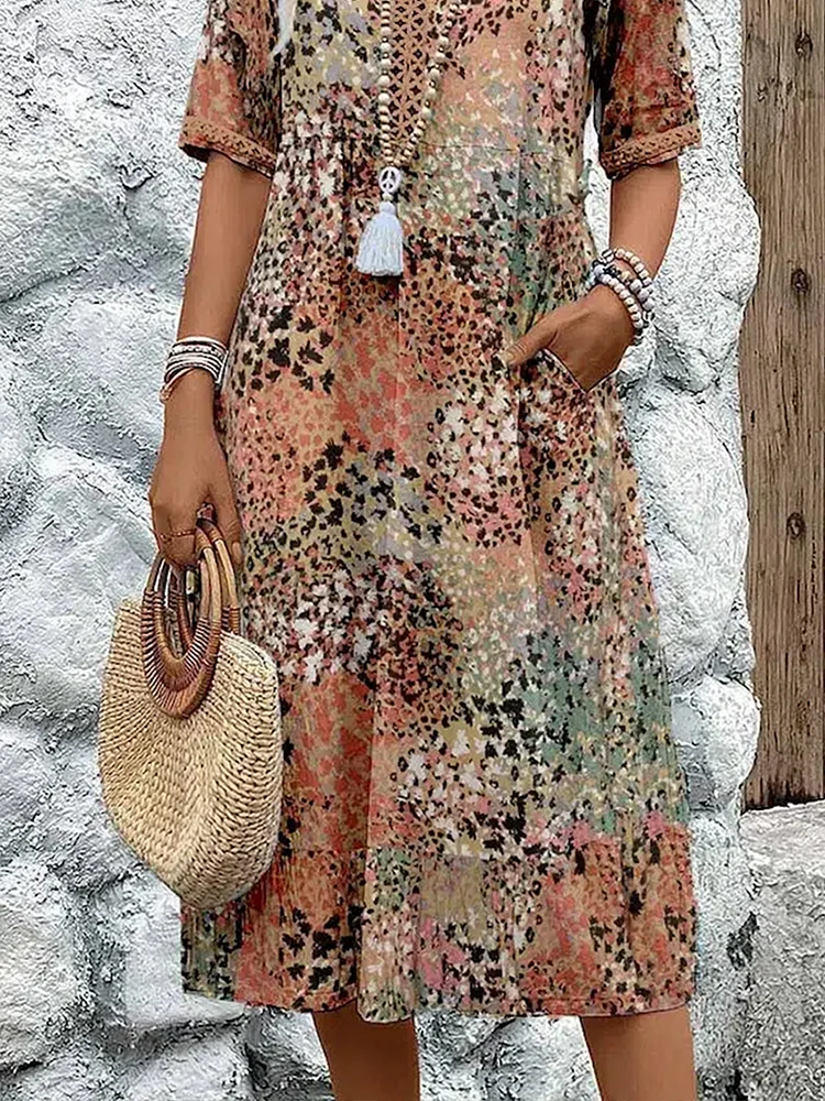 Damen Kleid mit V-Ausschnitt | Knielänge und Musterdesign
