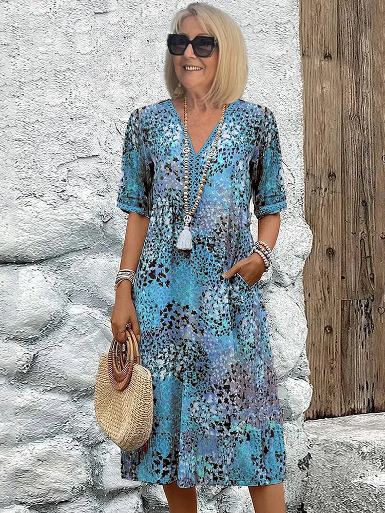Damen Sommerkleid | V-Ausschnitt mit Muster und Knielänge