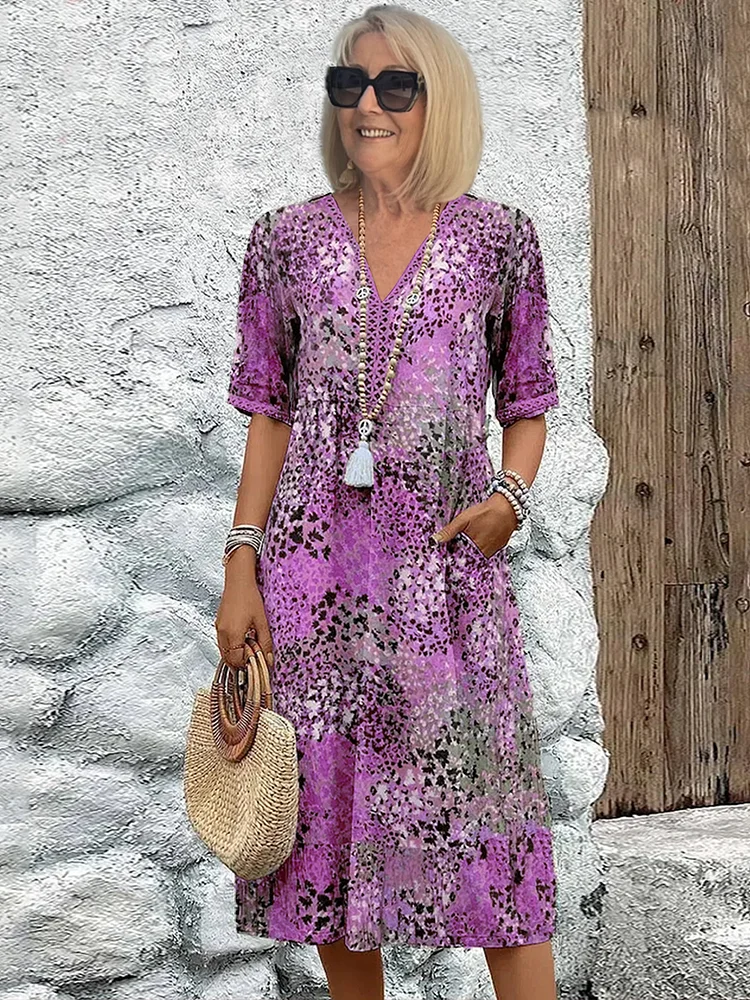 Damen Kleid mit V-Ausschnitt | Knielänge und Musterdesign