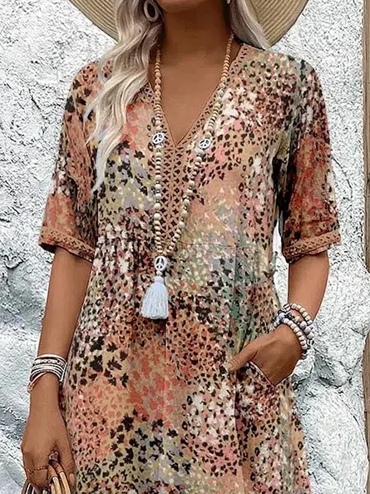 Damen Sommerkleid | V-Ausschnitt mit Muster und Knielänge